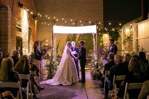 bride and groom in courtyard